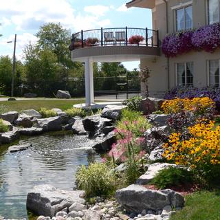 Christie's Mill Inn and Spa | Port Severn, Ontario | Pond and garden outside resort