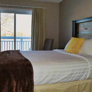 Christie's Mill Inn and Spa | Port Severn, Ontario | Queen bedroom with balcony 